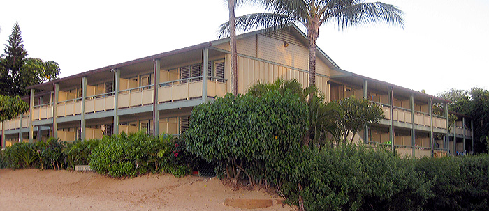 Unit 112 is the fourth ground floor unit on the right side of this picture.  It is only 40 feet from the lanai to the sand.